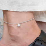 Сребърна Гривна за Глезен Блясък S925, с родиево покритие и декоративен елемент.