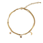 Двойна гривна за глезен с висящи символи луна, сърце и звезда, златисто покритие, подходяща за ежедневна употреба.