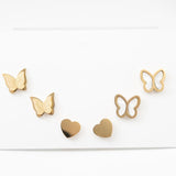 Gold butterfly and heart earrings set, perfect for multiple piercings and stylish looks.