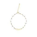 Златисто перо с малки черни топчета