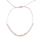 Бохо гривна за глезен в розово с мъниста и фини детайли, ръчно изработена и регулируема.