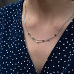 Двойно колие с плетка и кубчета, изработено от медицинска стомана с 16К златно покритие.