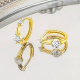 Сребърни Обеци Lumi S925 с блестящи кристали и елегантен дизайн на огледална повърхност.