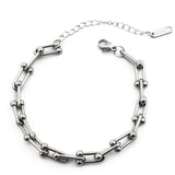 Двойна преплетена гривна в сребристо