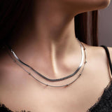 Двойно колие змийска плетка и нежни топчета