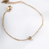 Мека гривна с кристал в розово злато