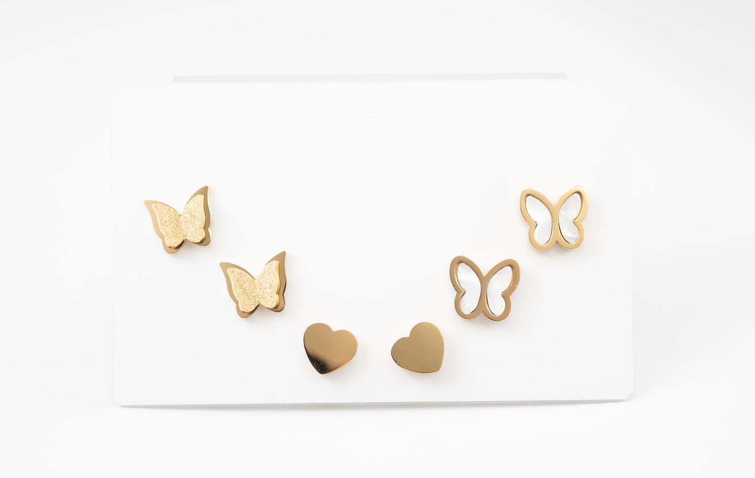 Gold butterfly and heart earrings set, perfect for multiple piercings and stylish looks.