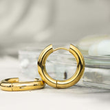 Овални златисти стоманени обеци