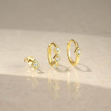 Сребърни обеци с 18K златно покритие и камъни, елегантен дизайн, идеални за всеки повод.