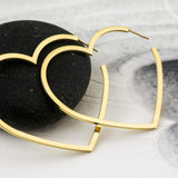 Златисти обеци сърце